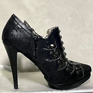 Dollhouse spiked heeled shoe with lace up detailing. Box-1